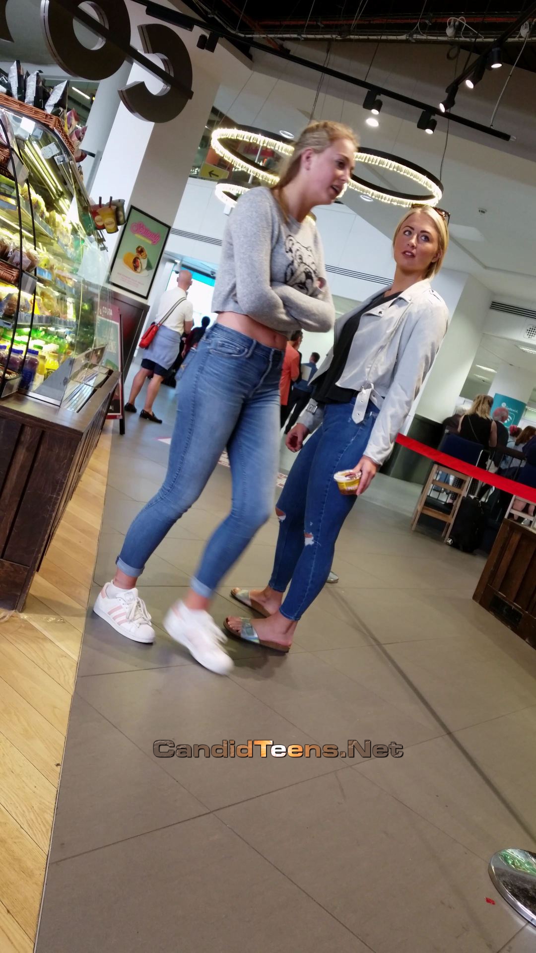 Beautiful face teens in sexy tight jeans - Candid Teens