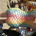 Hot Pride Girl Juicy Ass Cheeks in Colorful Fishnet Body Suit Public Candid Photo_1785600709967